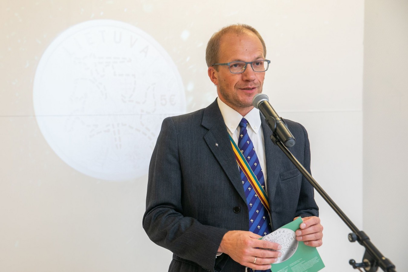 Kartu su moneta išleisto lankstinuko autorius Giedrius Globys